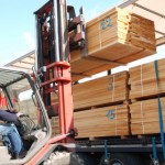 Forklift loading lumber