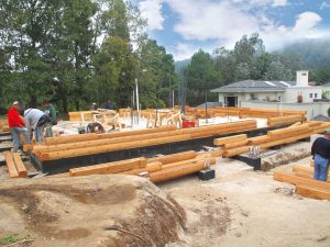 Stacking a log wall